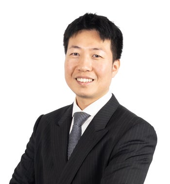 Portrait of Shawn Xu, Associate.